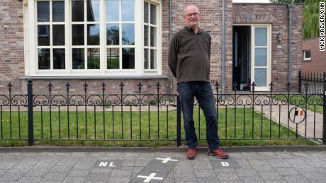 Though most of Julien Leemans' The house is in the Netherlands, the front door is in Belgium.