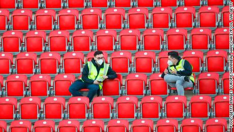 The guards wearing protective masks sat in empty stands at Union Berlin's home stadium, with all Bundesliga matches until the end of the season played behind closed doors.
