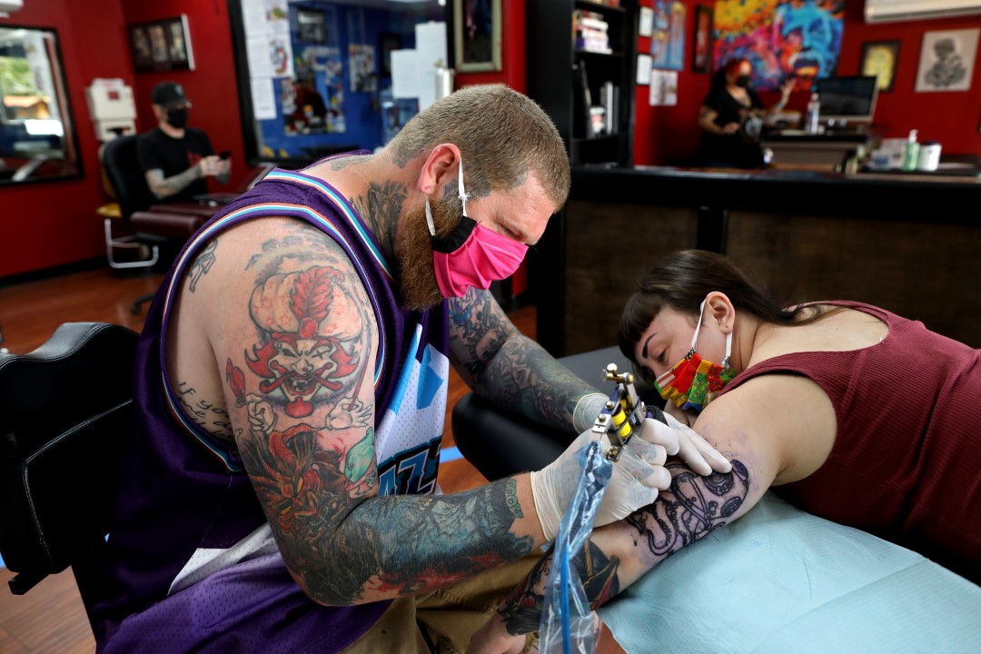 Andrew Wagner applied octopus tattoos to Jordan Curiel in Yuba City.