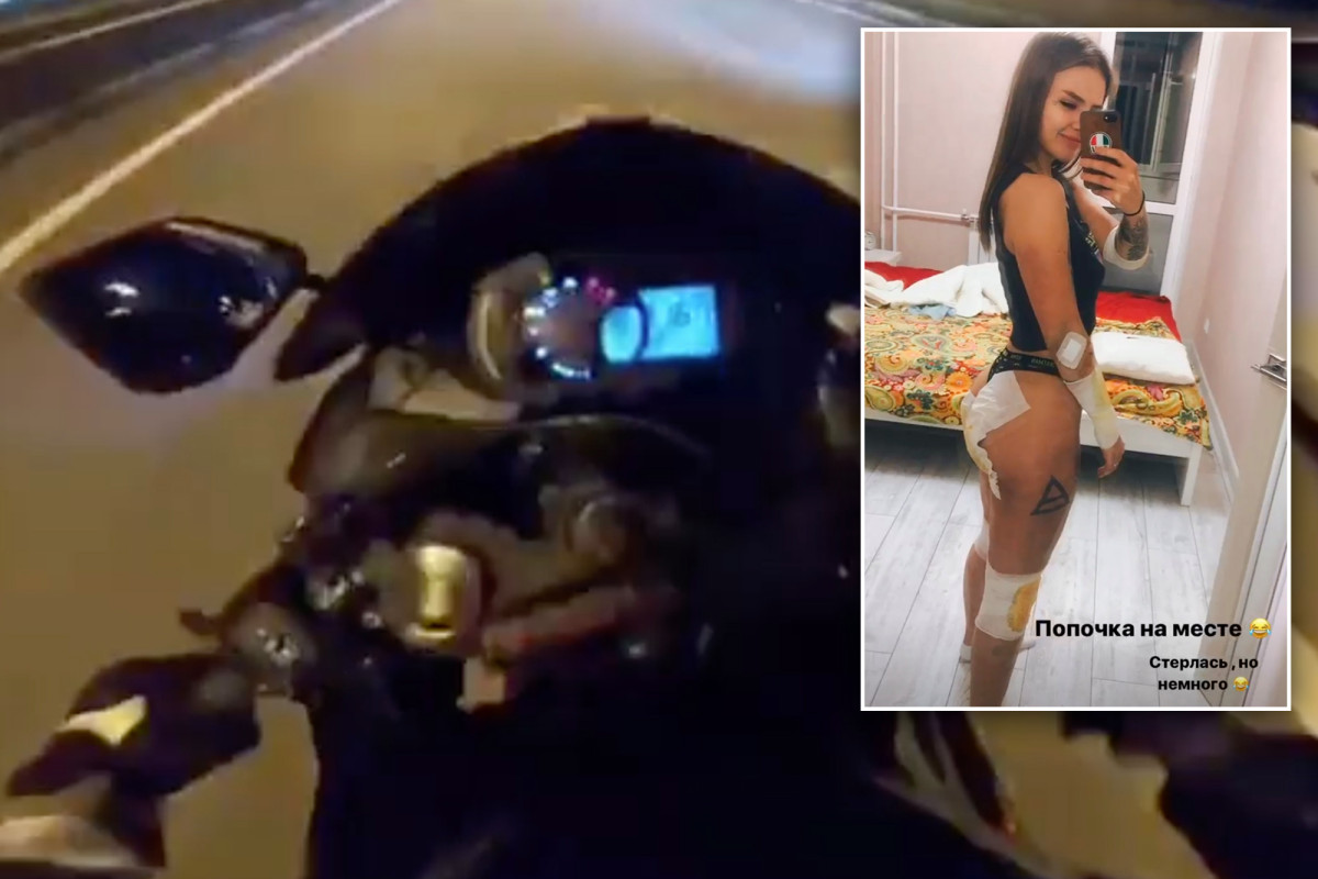 Woman crashing into a motorcycle during a 120 mph street race in Russia