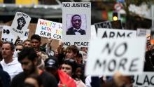 Protesters marched on Queen Street in Auckland, New Zealand on Monday. 