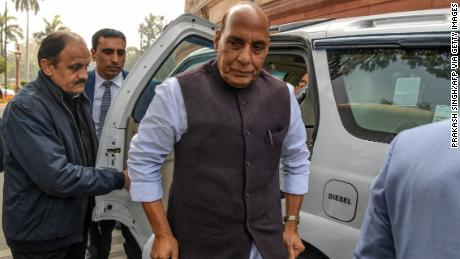Indian Defense Minister Rajnath Singh (C) arrived at Parliament in New Delhi on 11 February.