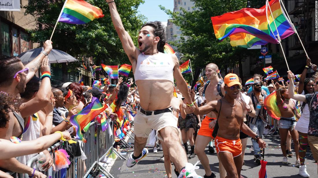 Participants take part in the NYC Pride March as part of WorldPride's commemoration of the 50th anniversary of the Stonewall riots, on June 30, 2019.