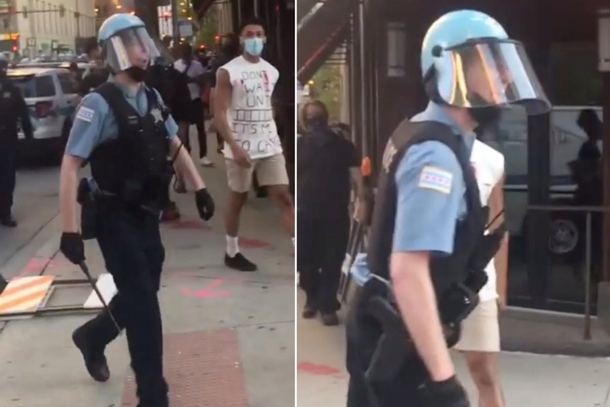 Chicago police catch screams of homophobia slur at protesters: video