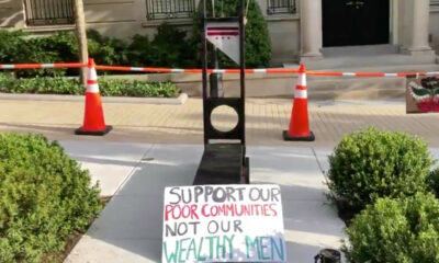Protesters installed guillotines in front of Jeff Bezos's home in DC