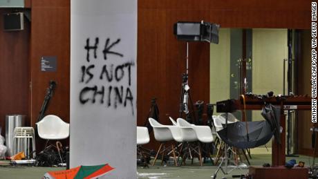 Graffiti and umbrellas were seen outside the main hall of the Legislative Council during a media tour in Hong Kong on July 3, 2019, two days after protesters entered the compound.