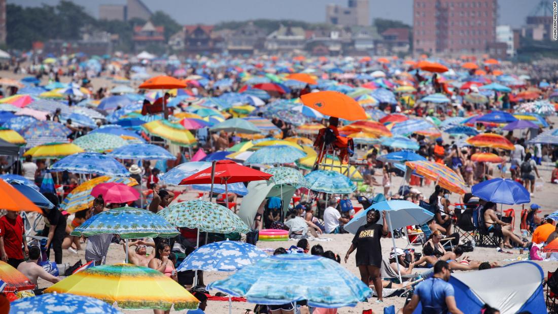 US coronavirus: Some celebrate July 4 virtually while others throng the beach even though Covid-19 is soaring