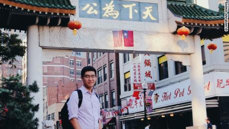 Tianyu Fang in Boston's Chinatown. Fang finished high school in the Boston area. 