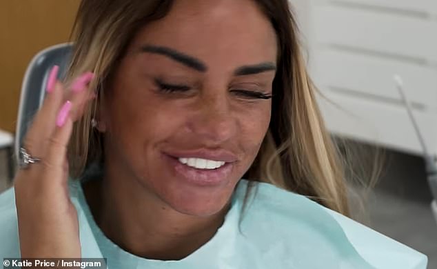 Replacement: Moments later, the clip showed Katie having her veneers replaced as a dentist fixed new teeth to her mental stumps, which she joked made her look a like 'Bond villain'