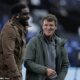 Former Manchester City striker Micah Richards shares a joke with fellow pundit Roy Keane before City against Liverpool in July