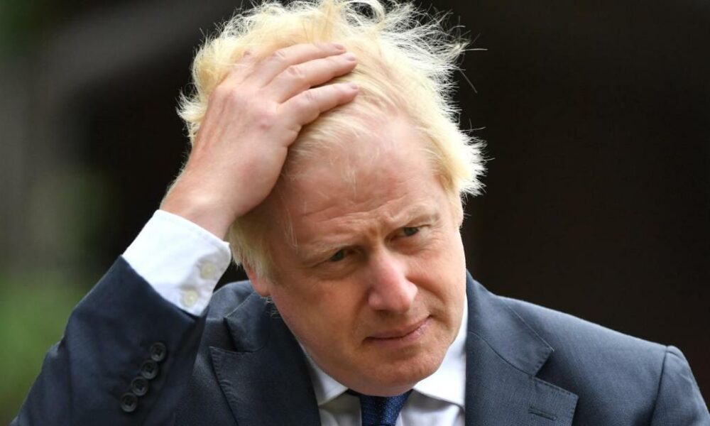 Boris Johnson attempts to grip UK schools crisis as political disaster looms