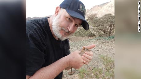 Researcher Steven Heritage with a Somali Sengi in his palm.