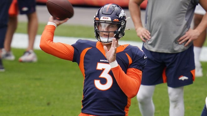 Denver Broncos quarterback Drew Locke takes part in training during a training session on an empty Empower field at Mile High on August 29, 2020 in Denver.