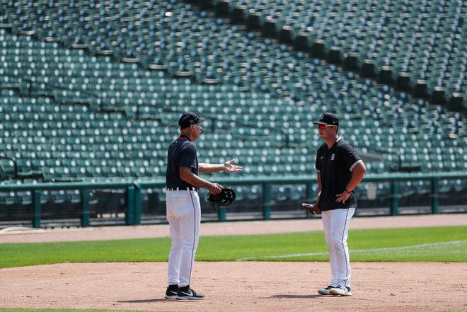 Alan Trammell instructs Detroit Tigers fielder Spencer Torkelson at third base during summer camp at Comerica Park in Detroit, Wednesday, July 8, 2020.