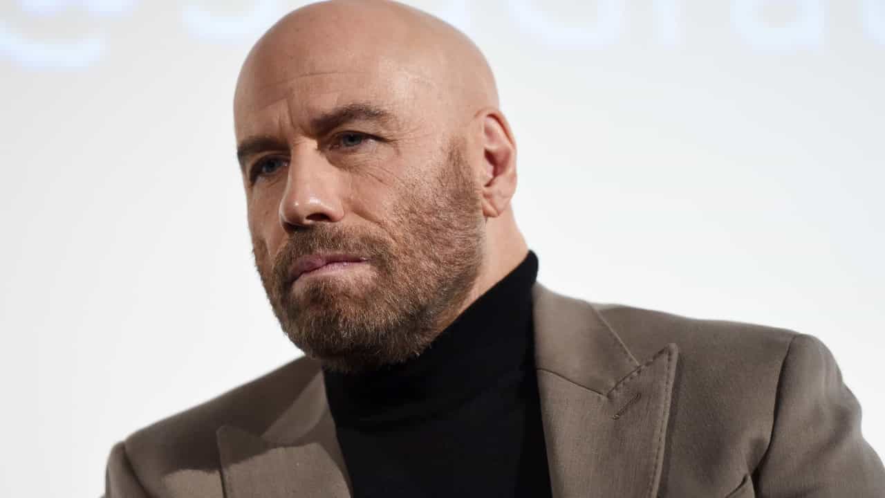 John Travolta recalls difficult conversation about death with 10-year-old son