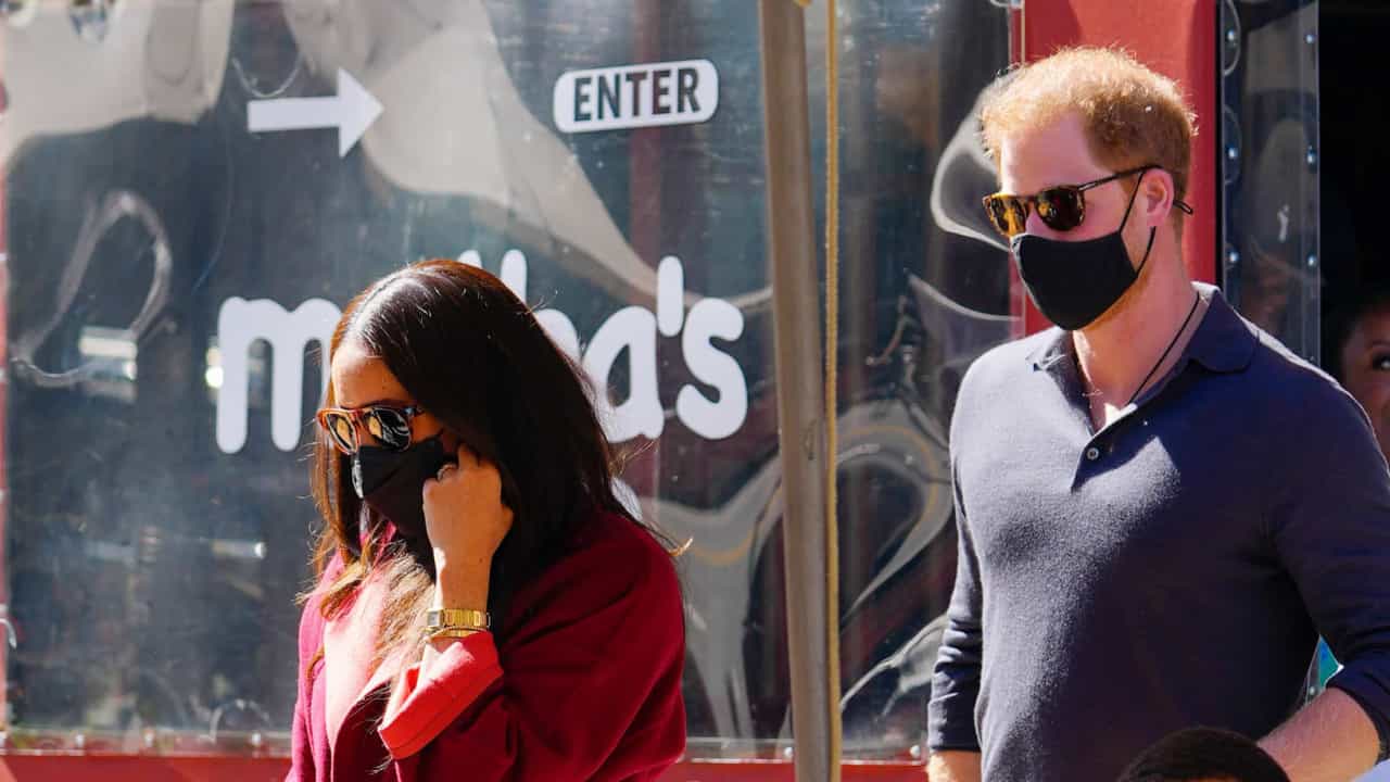 Harry and Meghan Markle are spotted at a restaurant after attending school.