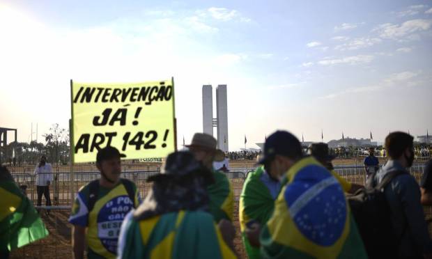 Supporters of President Bolsonaro protest democracy in Brasilia.  Photo: Mateusz Bonomi / Agencia O Globo.