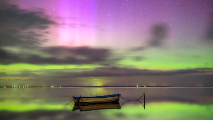 Image of auroras caused by solar winds hitting our atmosphere