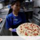 Traditional pizzas are replacing Domino's fast food in Italy - Companies