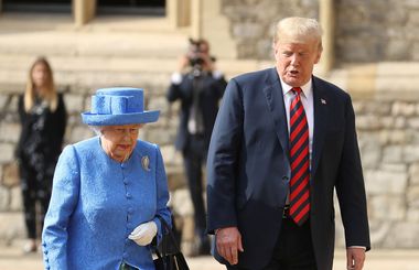 Queen Elizabeth II inspects the royal guard with US President Donald Trump.  She wears a brooch made famous by photography. "Three queens in mourning"taken during the funeral of King George IV.