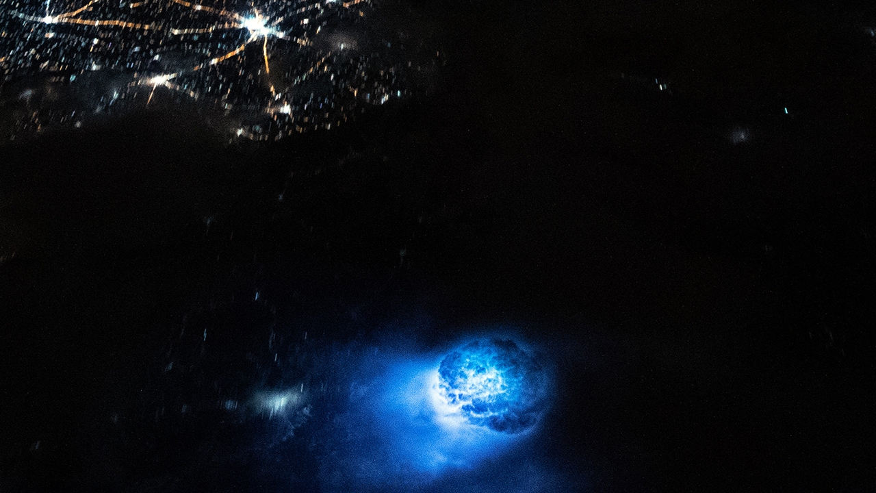 An International Space Station astronaut photographs stunning blue spheres hovering above the Earth.